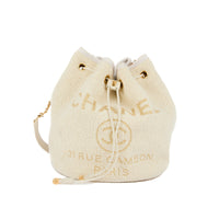 CHANEL - Sac à main Seau Deauville tweed écru doré - Handbag