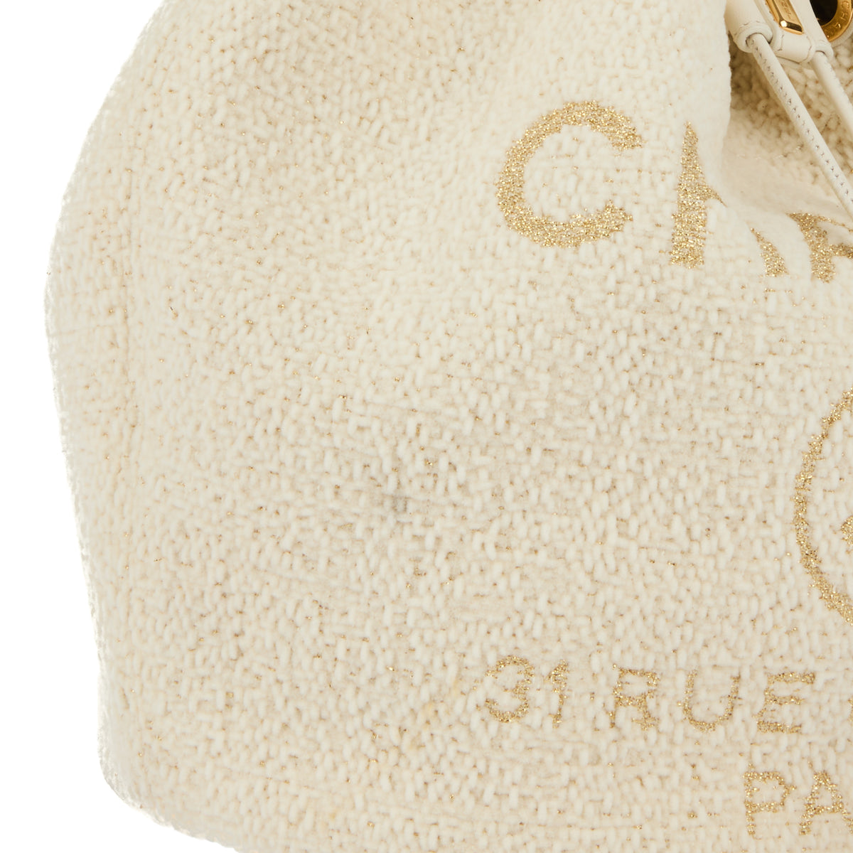 CHANEL - Sac à main Seau Deauville tweed écru doré - Handbag