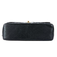 CHANEL - Classic Jumbo Bag in black grained leather