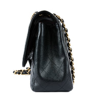 CHANEL - Classic Jumbo Bag in black grained leather