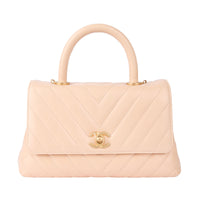 CHANEL - Sac bandoulière Coco handle cuir chevron beige - Handbag