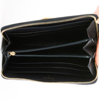 CHANEL - Portefeuille Zip Boy cuir chevron bleu - Wallet