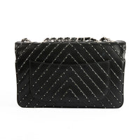 CHANEL - Sac bandoulière Studded Clous cuir chevron noir - Handbag