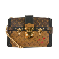 LOUIS VUITTON - Sac à main Pochette Trunk toile Monogram Reverse - Handbag