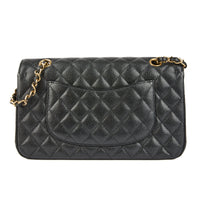 CHANEL - Sac bandoulière Classique 11.12 Timeless Medium cuir caviar noir - Handbag