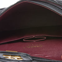 CHANEL - Sac bandoulière Classique Timeless Medium cuir caviar noir - Hand bar