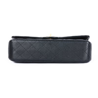 CHANEL - Sac bandoulière Classique Timeless Medium cuir caviar noir - Hand bag