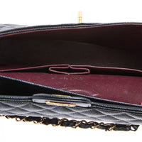 CHANEL - Sac bandoulière Classique Timeless Medium cuir caviar noir - Hand bag