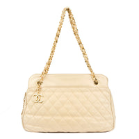 CHANEL - Sac à main cabas Caméra vintage Logo CC cuir matelassé beige - Handbag