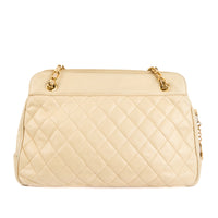 CHANEL - Sac à main cabas Caméra vintage Logo CC cuir matelassé beige - Handbag
