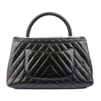 CHANEL - Sac à main Coco Handle chevron cuir noir - Handbag