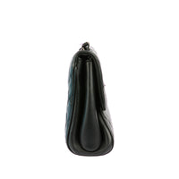 CHANEL - Sac bandoulière Fold Up Again Flap matelassé cuir noir - Handbag