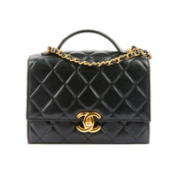 CHANEL - Sac bandoulière Golden Plate Top Handle cuir matelassé noir - Handbag