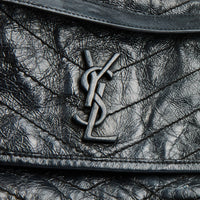 SAINT LAURENT - Baby Niki shoulder bag in black leather - Handbag