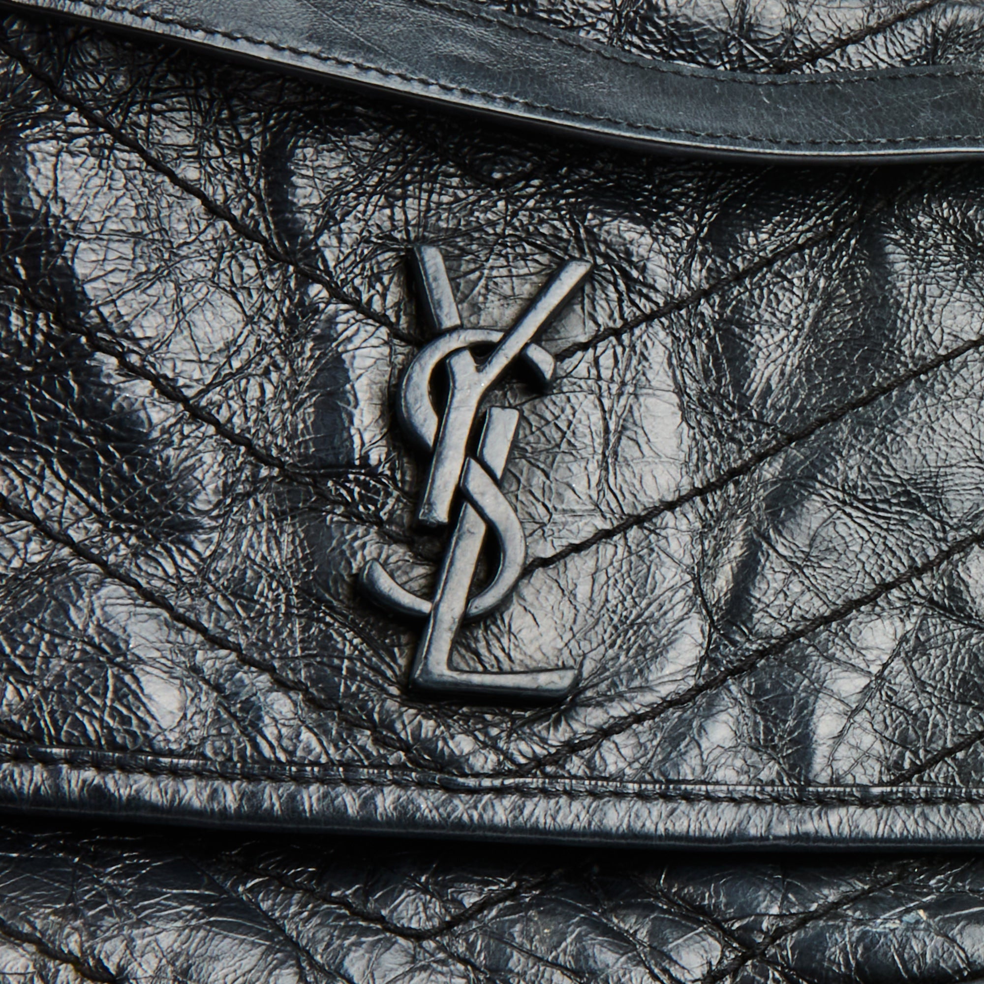SAINT LAURENT - Baby Niki shoulder bag in black leather - Handbag