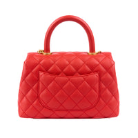 CHANEL - Sac bandoulière Mini Coco Handle cuir caviar rouge - Handbag