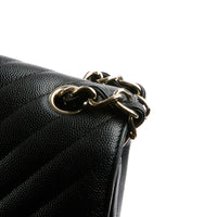 CHANEL - Sac bandoulière Jumbo Classique cuir chevron caviar noir - handbag