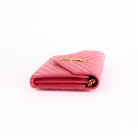 SAINT LAURENT - Sac bandoulière Enveloppe Cassandre cuir rose - Hand Bag