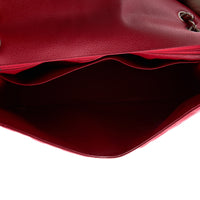 CHANEL - Sac à main Timeless Maxi Jumbo cuir caviar rouge - Hand bag