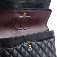 CHANEL - Sac bandoulière Timeless Medium classique cuir caviar noir - Hand bag
